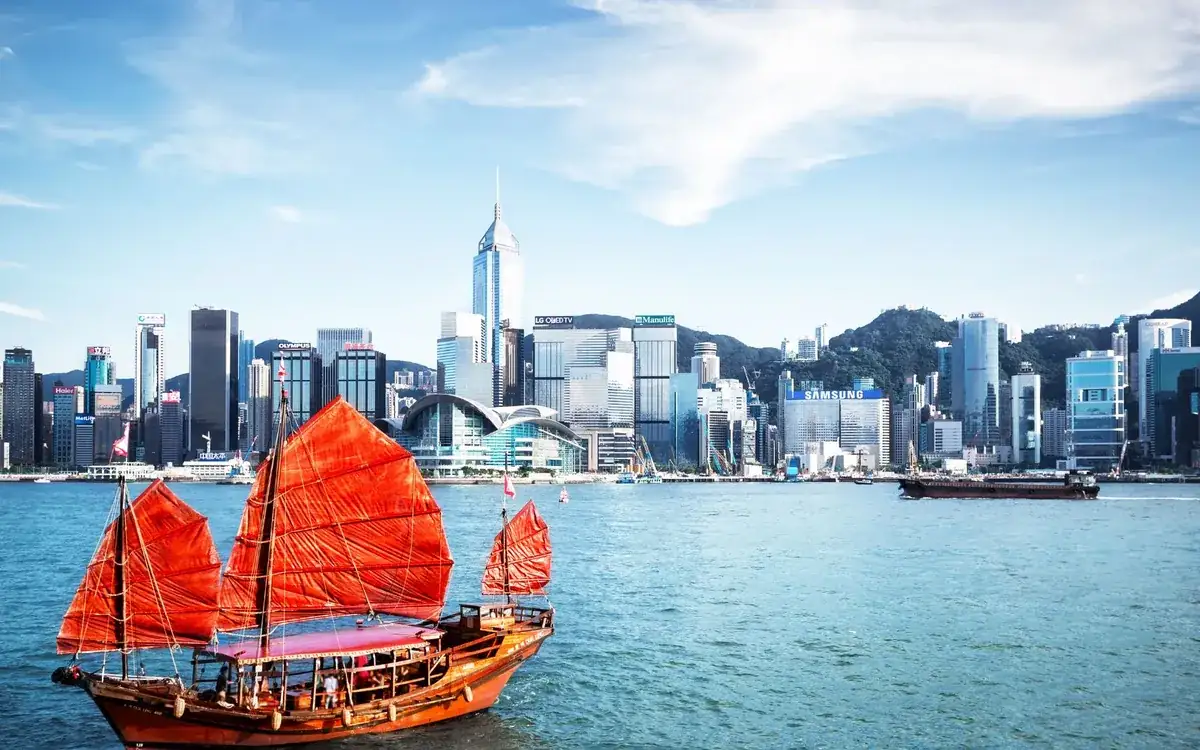 Traditional red-sail junk boat in Victoria Harbour